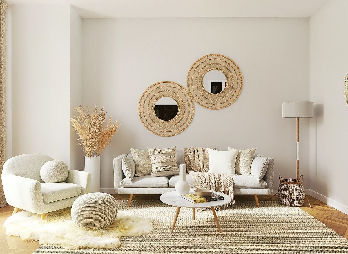 Salon cosy et lumineux aux tons naturels avec mobilier aux formes courbes